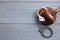 Flat lay composition with handcuffs and gavel on wooden table, space for text. Criminal law