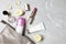 Flat lay composition with natural female deodorant and cosmetics on marble table