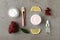 Flat lay composition with natural pomegranate facial mask on grey table