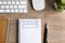 Flat lay composition of notebook with word Promocode on wooden table