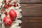 Flat lay composition with painted red Easter eggs on wooden table