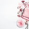 Flat lay composition of pink accessories to female holidays: Mothers day , Womens day, birthday. Paper shopping bag with flowers,