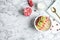 Flat lay composition with quinoa porridge, milk and space for text on marble background