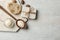 Flat lay composition with Shea butter and handmade soap on light background