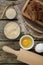 Flat lay composition with sourdough on wooden table