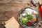 Flat lay composition with symbolic Passover Pesach items on wooden background