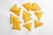 Flat lay composition of tortilla chips nachos on white background