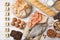 Flat lay composition of various  and cubes with word allergy on white wooden table