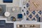 Flat lay of creative architect moodboard composition with samples of building, textile and natural materials and personal.