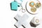 Flat lay desktop objects in white marbe and aqua