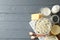 Flat lay. Different dairy products on grey wooden background