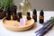 flat lay of essential oils, diffuser, and lavender