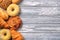 Flat lay with festive sweet pastry and bakery on natural wooden background