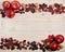 Flat lay frame of autumn crimson leaves, hazelnuts, walnuts and