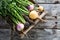 Flat lay of fresh imperfect vegetables in old wooden crate