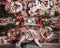 Flat-lay of friends hands eating and drinking together. Top view of people having party, gathering, celebrating together at wooden