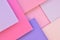 Flat lay geometric paper background. Square pastel tone pink and violet layers with shadows