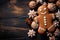 Flat lay ginger Christmas cookies and gingerbread man on a wooden background with copy space