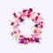 Flat lay greeting wreath of colorful fuchsia flower with place f