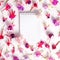 Flat lay of heads hybrid colorful fuchsia flowers and empty note