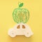 Flat lay image of green decorative apple over wooden car. Rosh hashanah jewish New Year holiday concept.