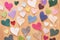 Flat lay image of many colorful hearts over wooden background.