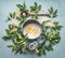 Flat lay of ingredients for seasonal traditional making of syrup and elderberry flowers: cooking pot, wooden spoon, sugar, lemon