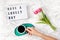 Flat lay with lightbox with text Have a lovely day and coffee cup. Social media, motivation quote, feminine blog, morning of