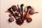 Flat lay make-up brushes, powders and shadows in brown and beige natural shades