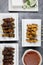 Flat lay of Malaysian chicken, beef and mutton satay