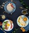 Flat lay. Menu. Three breakfasts, oatmeal, fried eggs, pancakes, tea, tea background