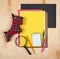 Flat lay office tools and supplies. Stationery on wood background. Flat design of workspace, workplace. Top view of desk backgroun