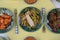 Flat lay overhead view of a table laid with Chinese food dishes