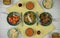 Flat lay overhead view of a table laid with Chinese food meat dishes
