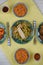 Flat lay overhead view of a table laid with Chinese rice and meat dishes