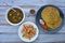 Flat lay of Paratha flatbread Indian cuisine served with traditional Punjabi Palak Paneer dish