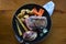 Flat lay of pice of a lamb meat fried with raw root vegetables i