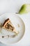 Flat-lay piece of vegan dairy-free sugar-free pear cheesecake in plate