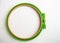 Flat lay plastic embroidery Hoop isolated on white background for needlework