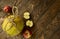 Flat lay, pomelo fruit in rope packaging and red apples on wooden table, top view with copy space