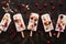 Flat lay popsicles with cranberries and almonds nuts on a dark background. Top view