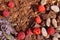 Flat lay  of Raw cocoa beans,  cocoa powder, chocolate on sacking  with mint and flower, raspberry