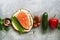 Flat lay raw salmon steak and fresh vegetables in a row on gray background. Top view, copy space