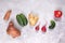 Flat lay set of fresh ripe ugly vegetables on grey concrete background.