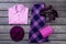 Flat lay set of purple women`s clothing.