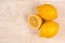 Flat lay sliced lemon above wooden planks background