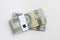 Flat lay, stack of bundle 2000 Rupiah Indonesia Money, at White Background