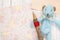 Flat lay stock photography flower pattern letter envelope cute blue bear holding wood pencil