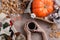 Flat lay style of autumn coffee, pumpkins and cinnamon sticks.