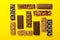 Flat lay with tasty granola bars yellow background,  top view
